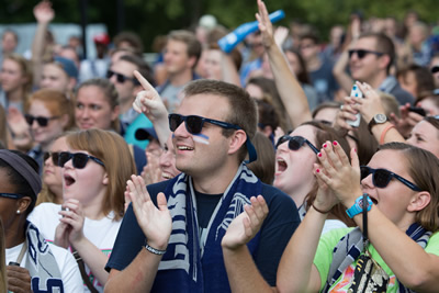 The campus community cheers during the big reveal of the Upchurch University Center plans