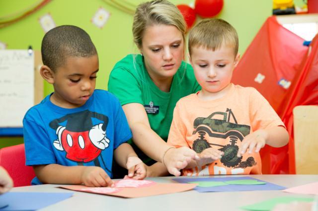 Student working with young children