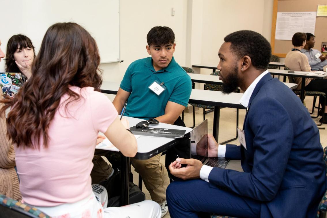 Students deliberate on citizenship and the issues citizens face in their communities on Symposium Day, the capstone of Longwood's Civitae Core Curriculum.